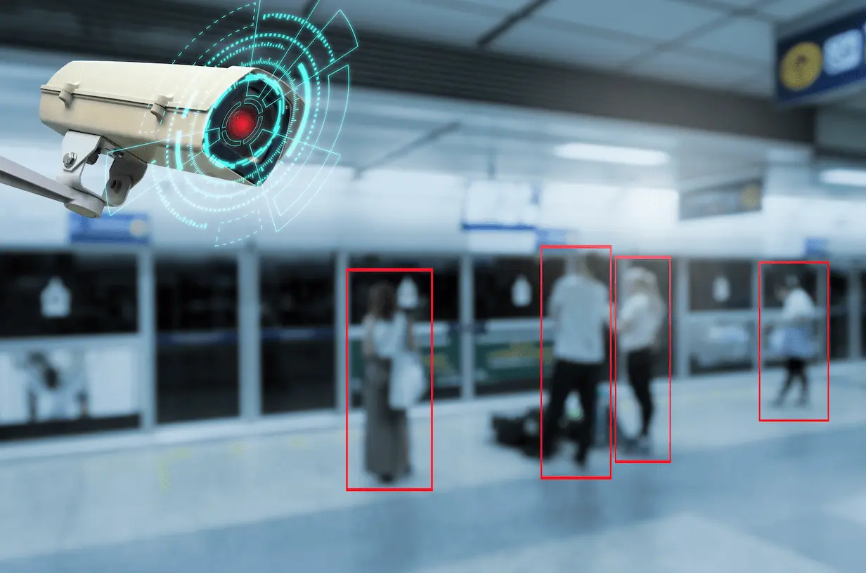 An AI-enabled CCTV camera detecting people with a smart surveillance system in a public indoor space.